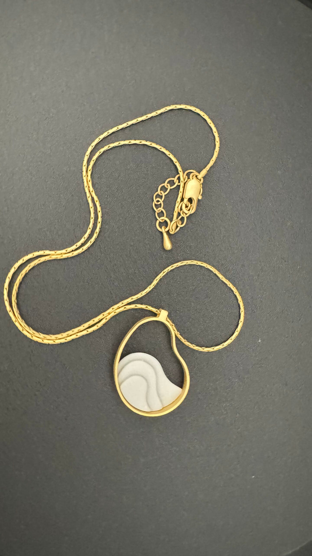 Atlas Necklace Gold & Cement by Ana Martínez and David de Felipe