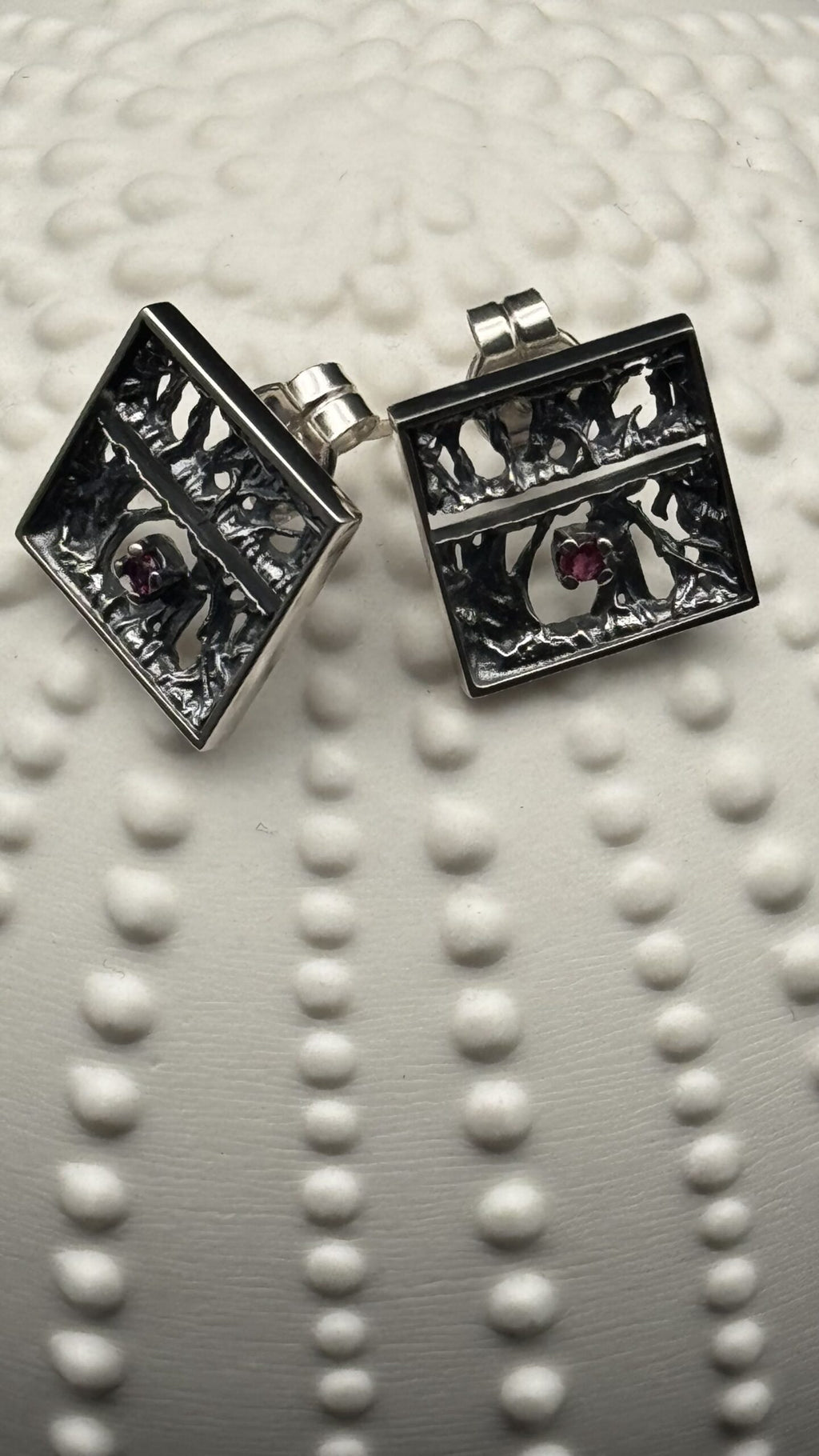 Fixed square Tanit earring, oxidized silver and 2.3mm ruby